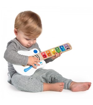 Guitare enfant Baby Einstein Magic Touch instrument musique bebe enfant amusant