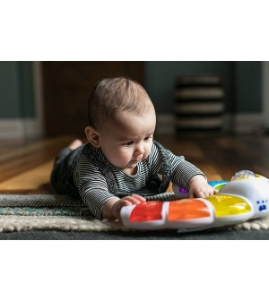 Arche lumineuse et sonore Baby einstein jouets éveil musical